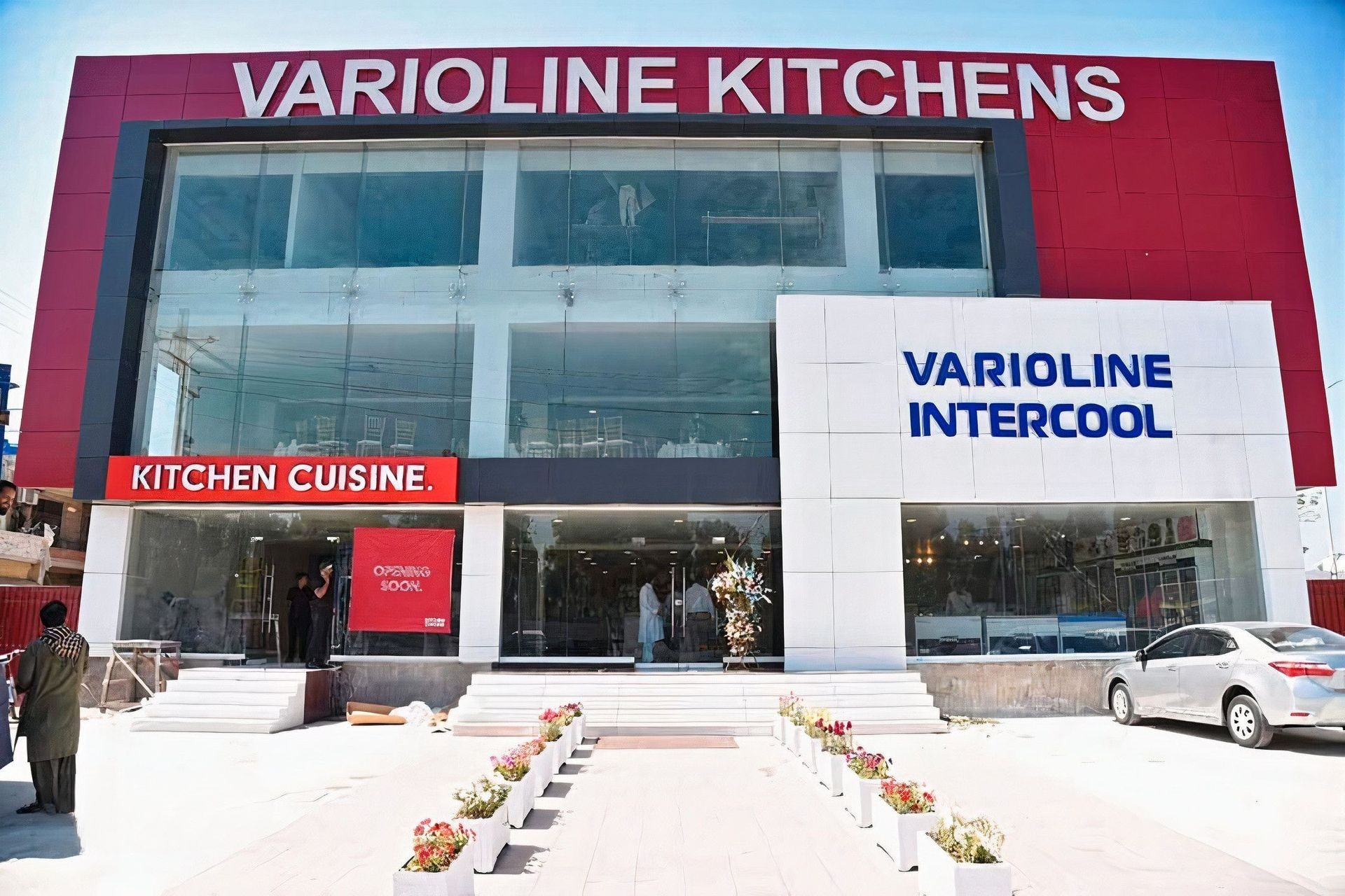 Exterior view of Varioline Kitchens and Varioline Intercool store with 'Opening Soon' sign.